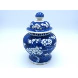 A Chinese ginger jar with prunus decor, four chara
