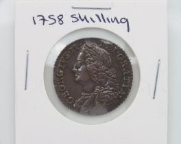 A 1758 George II silver shilling of high grade