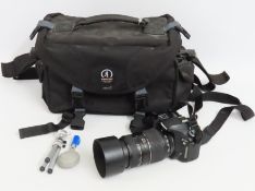 A Pentax K100 digital SLR camera with case & acces