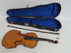 A cased violin, 605mm long