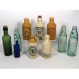 A selection of mixed bottles including codd & ston