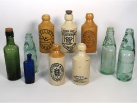 A selection of mixed bottles including codd & ston