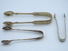Three pairs of silver tongs: London 1881, London 1