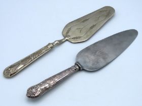 An English silver handled cake slice twinned with