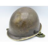 A WW2 US military M1 helmet