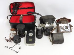A Neoca Rangefinder 35mm film camera, a Praktica MTL3, a Strathcona lens 135mm & other accessories