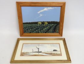 A framed oil of daffodils with pickers in field si