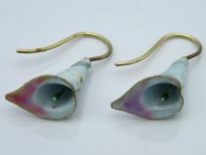 A pair of yellow metal enamelled floral earrings,