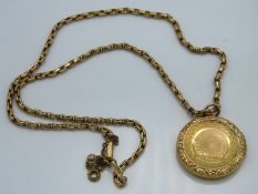 A 9ct gold locket with 410mm long gold chain, 10.7