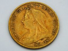 A 1900 22ct gold half sovereign, old head
