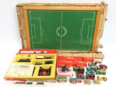 A Soccerette football game, a boxed Britains 120mm