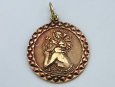 A 9ct gold St. Christopher pendant, some wear, 4.3
