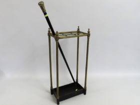 A brass & cast iron umbrella stand with drip tray