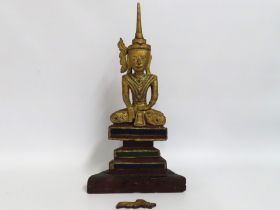An antiquated Tibetan gilded & jewelled carved woo