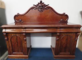 A Victorian mahogany sideboard with three drawers
