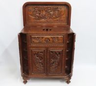 A mid century Chinese carved teak drinks bar cabin