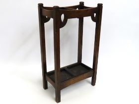 An oak stick stand with drip tray, 712mm tall x 41
