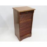A mahogany tambour roll front filing cabinet, 900m