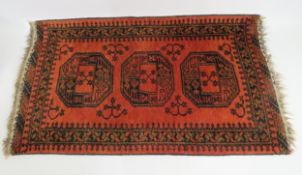 An Afghan wool Kargahi style rug, 1310mm x 740mm, excluding fringe