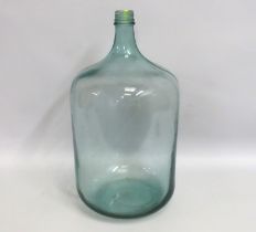 A glass demijohn, 550mm tall, twinned with a selec