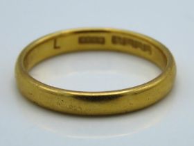 A 22ct gold band, 3.6g, size N/O