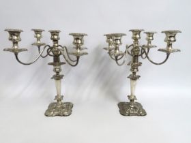 A pair of four branch with centre, silver plated c
