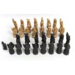 An Oriental chess set, some faults. King 130mm high