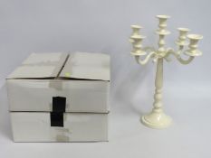 Three cream wedding candelabra, two boxed, 460mm tall with a span of 340mm