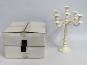 Three cream wedding candelabra, two boxed, 460mm tall with a span of 340mm