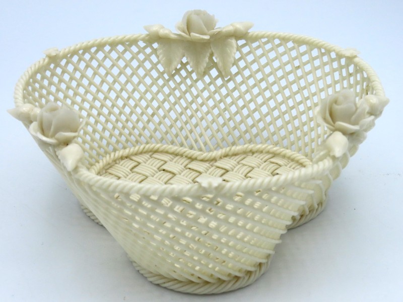 A Belleek porcelain trefoil basket with applied fl
