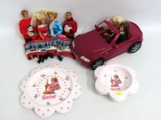 A Barbie Christmas set with friends, car, six figu