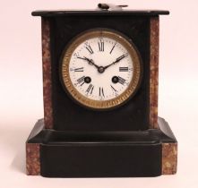 A c.1900 slate mantle clock with marble trim, 225m
