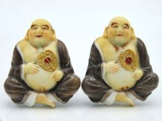A pair of Japanese Toshikane Buddha cufflinks
