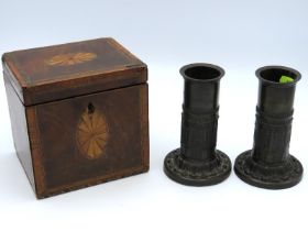 A Regency period tea caddy with inlaid decor, some