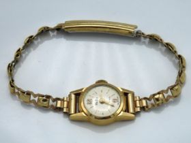 A ladies 18ct gold cased MuDu wristwatch, winds & runs