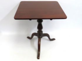A 19thC. square mahogany tilt top pedestal table,