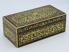 A 19thC. brass inlaid tortoiseshell Boulle work bo