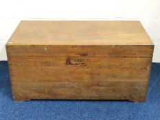 An oak zinc lined travel trunk with handles to sid