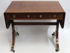 An antique mahogany sofa table, 1400mm wide, exten