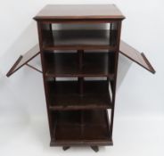 A 19thC. mahogany revolving bookcase, lacking lowe