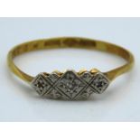 An antique 18ct gold ring set with platinum mounte