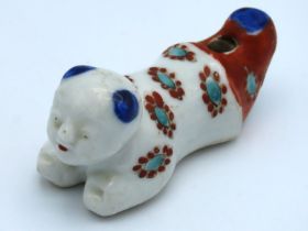 A 19thC. Japanese porcelain whistle with enamelled