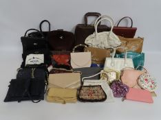 A quantity of twenty-nine handbags including Prada, Charles Jourdan, Franco Bellini for Russell & Br
