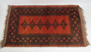 An Afghan wool Kilim style rug, 1360mm x 780mm excluding fringe