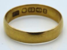 A 22ct gold band, 2.4g, size M/N