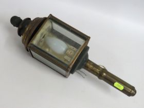 An electric carriage style lamp