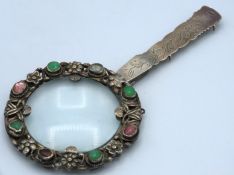 A Chinese silver belt hook magnifier with jewelled