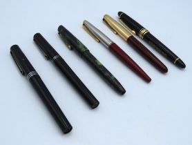 Six fountain pens, one German, three Osmiroid & tw