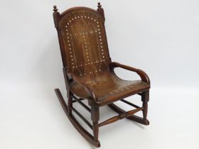 A Victorian childs rocking chair, 590mm high to ba