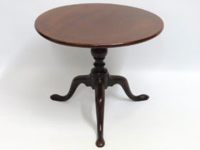 A 19thC. low level tilt top pedestal table, 585mm